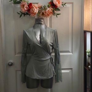 Sage green lace sleeve jersey wrap top